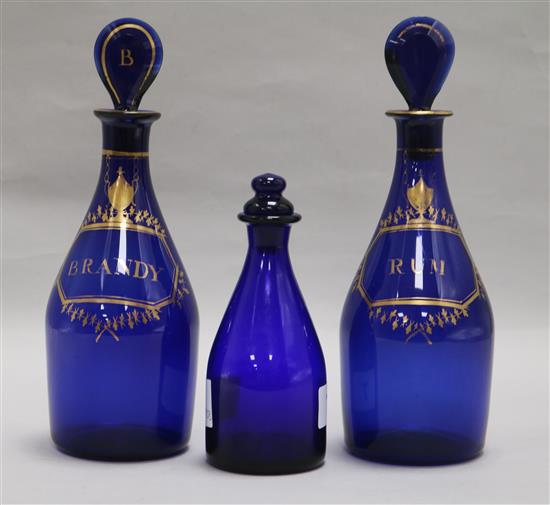 Two Bristol Blue glass, Brandy Rum decanters and another (3)